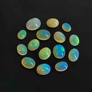 24.15 Cts. Ethiopian Opal 8x6-12x10mm Smooth Oval Shape AA Grade Cabochons Parcel - Total 15 Pcs.