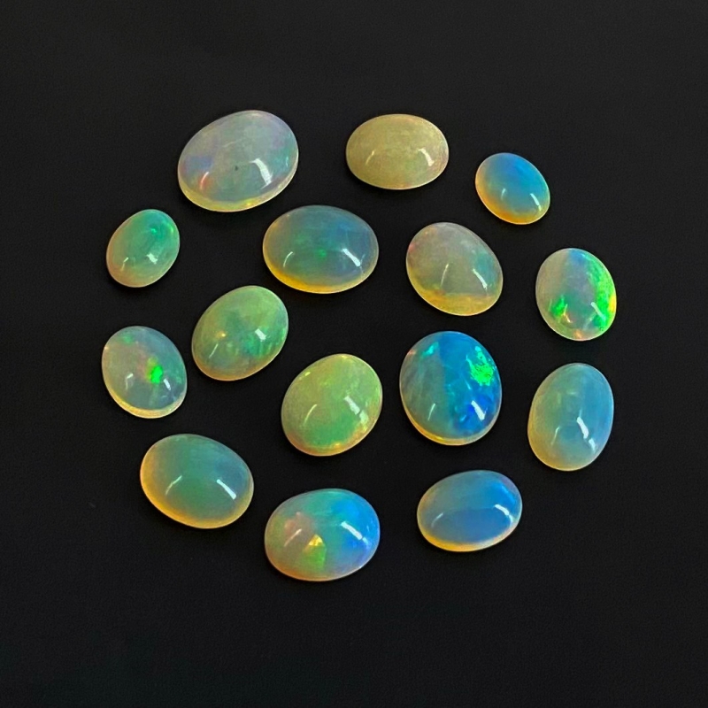 24.15 Cts. Ethiopian Opal 8x6-12x10mm Smooth Oval Shape AA Grade Cabochons Parcel - Total 15 Pcs.