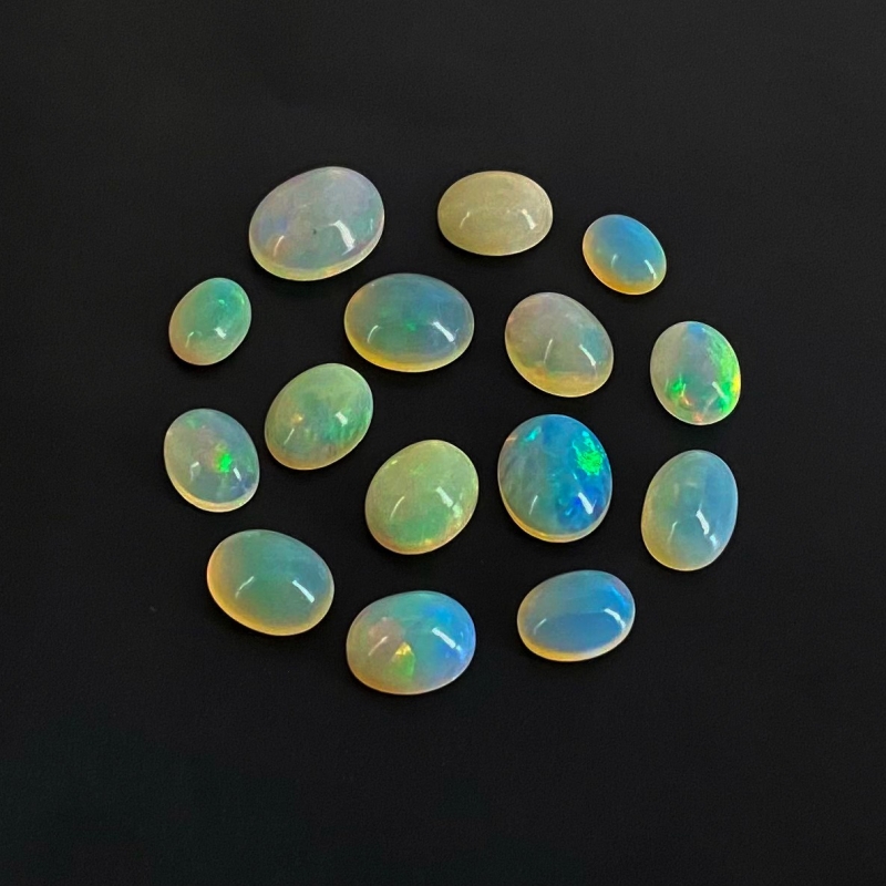 24.15 Cts. Ethiopian Opal 8x6-12x10mm Smooth Oval Shape AA Grade Cabochons Parcel - Total 15 Pcs.