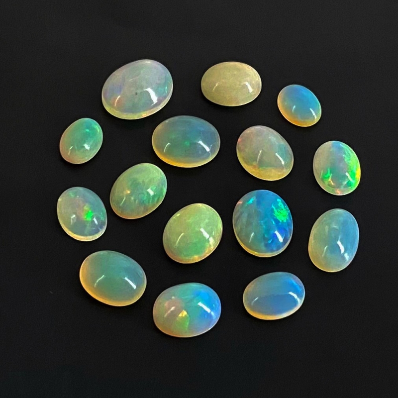 24.15 Cts. Ethiopian Opal 8x6-12x10mm Smooth Oval Shape AA Grade Cabochons Parcel - Total 15 Pcs.