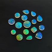26.15 Cts. Ethiopian Opal 0.90-3.45mm Smooth Mix Shape AAA Grade Cabochons Parcel - Total 16 Pcs.