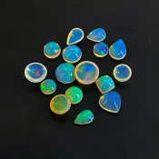 26.15 Cts. Ethiopian Opal 0.90-3.45mm Smooth Mix Shape AAA Grade Cabochons Parcel - Total 16 Pcs.