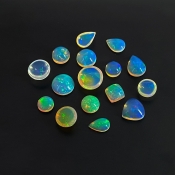 26.15 Cts. Ethiopian Opal 0.90-3.45mm Smooth Mix Shape AAA Grade Cabochons Parcel - Total 16 Pcs.