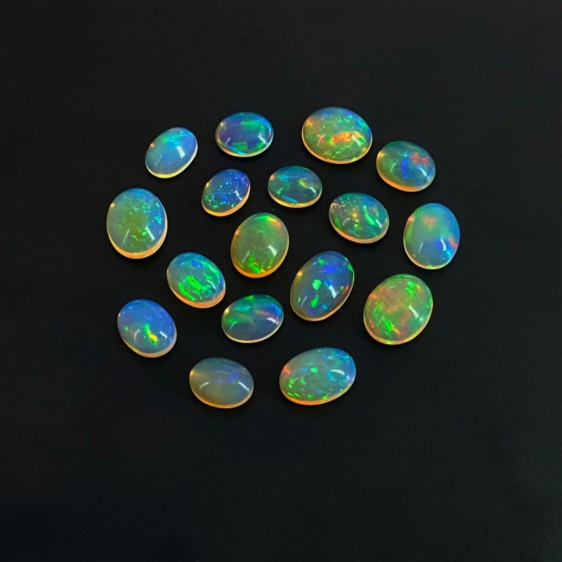 26.20 Cts. Ethiopian Opal 8X6-11X9mm Smooth Oval Shape AAA+ Grade Cabochons Parcel - Total 17 Pcs.