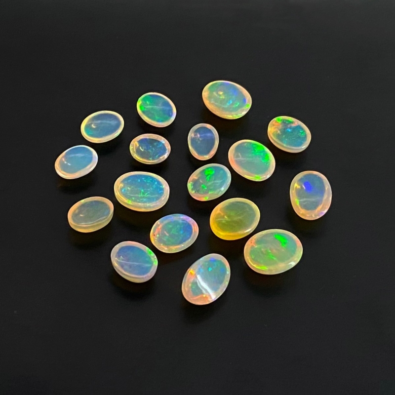 26.20 Cts. Ethiopian Opal 8X6-11X9mm Smooth Oval Shape AAA+ Grade Cabochons Parcel - Total 17 Pcs.