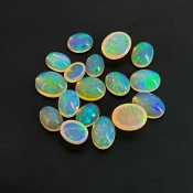 26.20 Cts. Ethiopian Opal 8X6-11X9mm Smooth Oval Shape AAA+ Grade Cabochons Parcel - Total 17 Pcs.