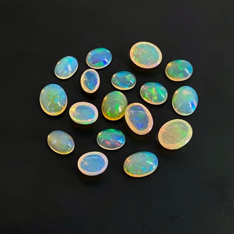 26.20 Cts. Ethiopian Opal 8X6-11X9mm Smooth Oval Shape AAA+ Grade Cabochons Parcel - Total 17 Pcs.