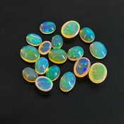 26.20 Cts. Ethiopian Opal 8X6-11X9mm Smooth Oval Shape AAA+ Grade Cabochons Parcel - Total 17 Pcs.