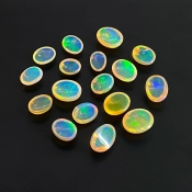 26.20 Cts. Ethiopian Opal 8X6-11X9mm Smooth Oval Shape AAA+ Grade Cabochons Parcel - Total 17 Pcs.