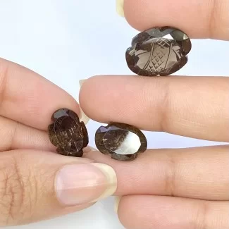 22.80 Cts. Smoky Quartz 14x10-17x12.5mm Carved Oval Shape AAA Grade Matched Gemstone Carvings Set - Total 3 Pcs.