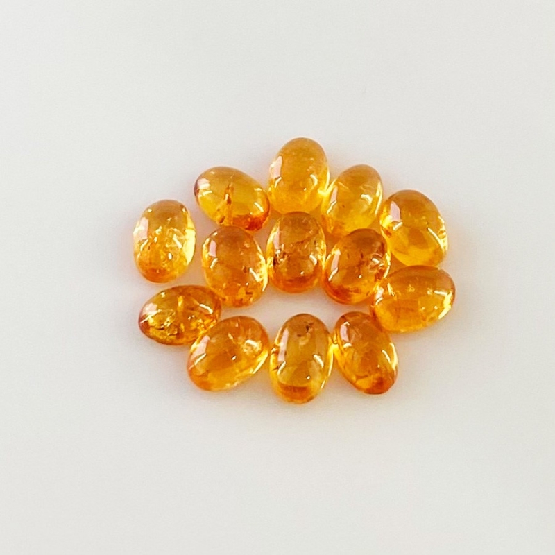9.85 Carat Spessartite Garnet 6x4mm Smooth Oval Shape AA Grade Cabochons Parcel - Total 13 Pcs.