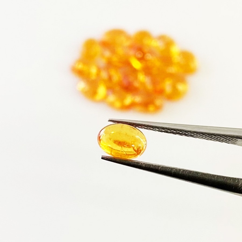 14.50 Carat Spessartite Garnet 6x4mm Smooth Oval Shape AA Grade Cabochons Parcel - Total 18 Pcs.