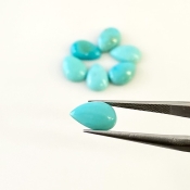 7.80 Cts. Turquoise 9x6mm Smooth Pear Shape AA+ Grade Cabochons Parcel - Total 7 Pcs.