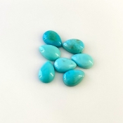 7.80 Cts. Turquoise 9x6mm Smooth Pear Shape AA+ Grade Cabochons Parcel - Total 7 Pcs.