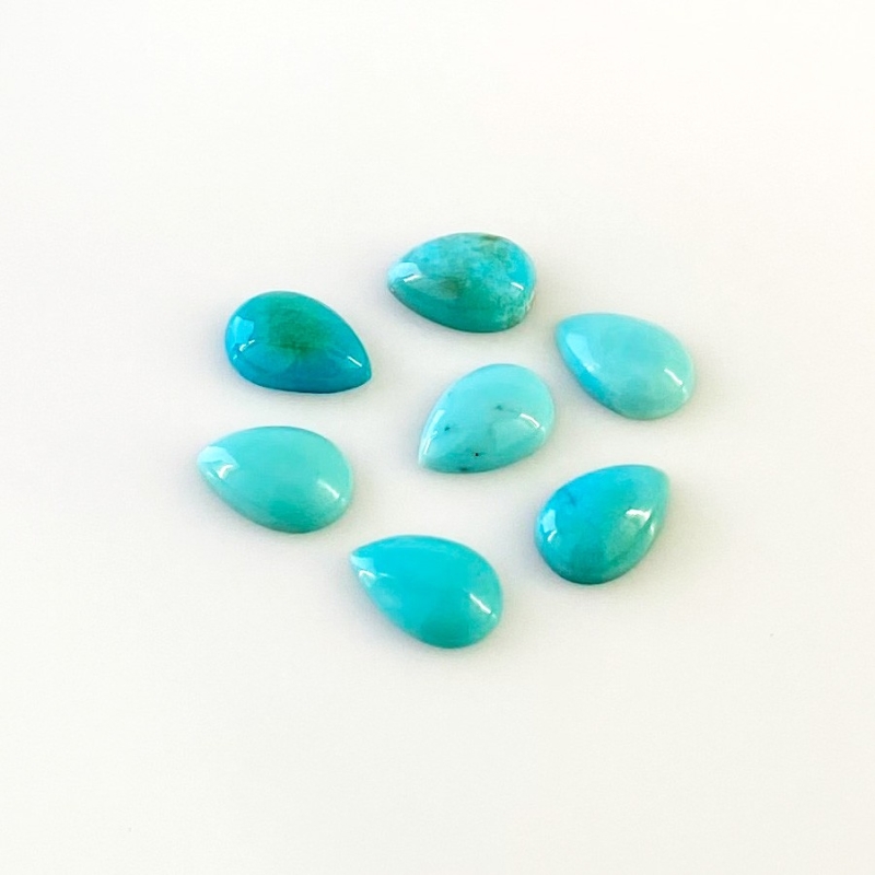 7.80 Cts. Turquoise 9x6mm Smooth Pear Shape AA+ Grade Cabochons Parcel - Total 7 Pcs.