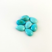7.80 Cts. Turquoise 9x6mm Smooth Pear Shape AA+ Grade Cabochons Parcel - Total 7 Pcs.