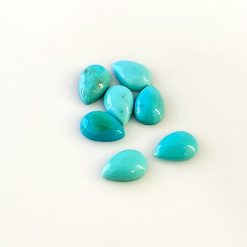 7.80 Cts. Turquoise 9x6mm Smooth Pear Shape AA+ Grade Cabochons Parcel - Total 7 Pcs.