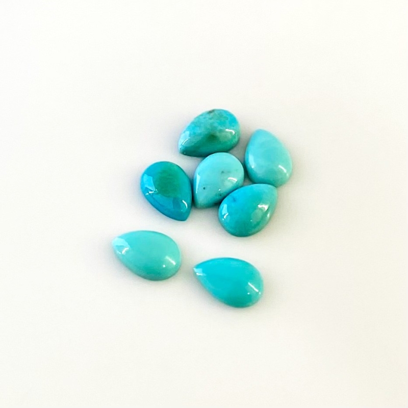 7.80 Cts. Turquoise 9x6mm Smooth Pear Shape AA+ Grade Cabochons Parcel - Total 7 Pcs.