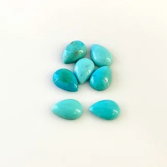 7.80 Cts. Turquoise 9x6mm Smooth Pear Shape AA+ Grade Cabochons Parcel - Total 7 Pcs.
