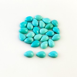 9.95 Cts. Turquoise 6x4mm Smooth Pear Shape AA+ Grade Cabochons Parcel - Total 26 Pcs.