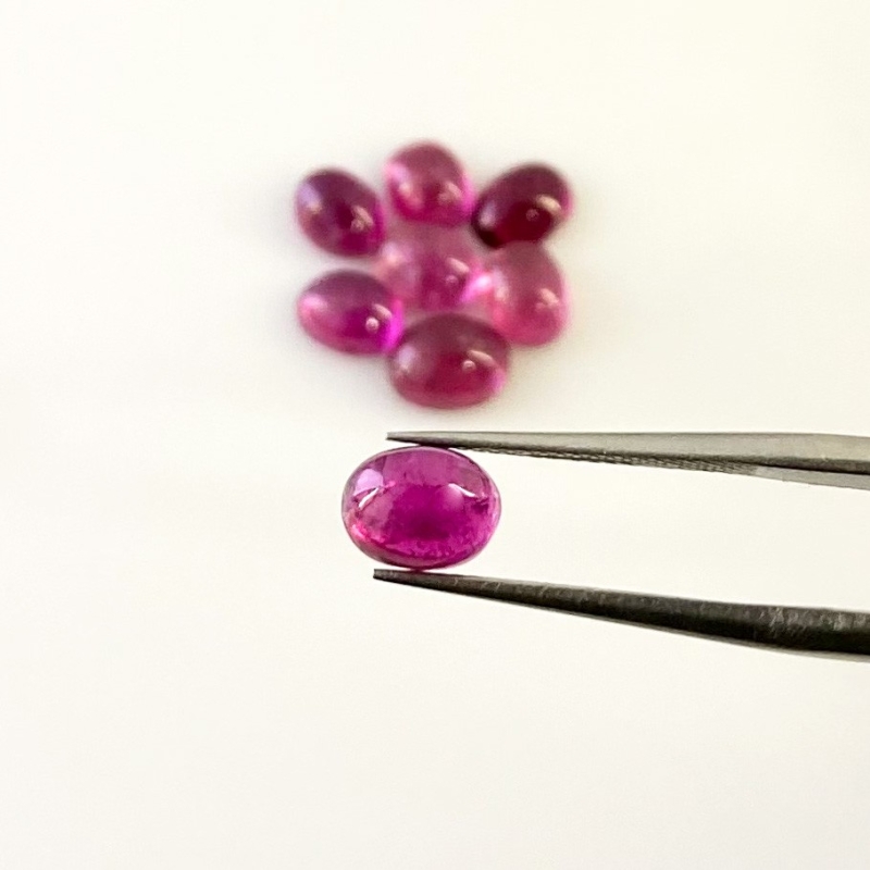 7.75 Cts. Rubellite Tourmaline 7x5mm Smooth Oval Shape A Grade Cabochons Parcel - Total 8 Pcs.