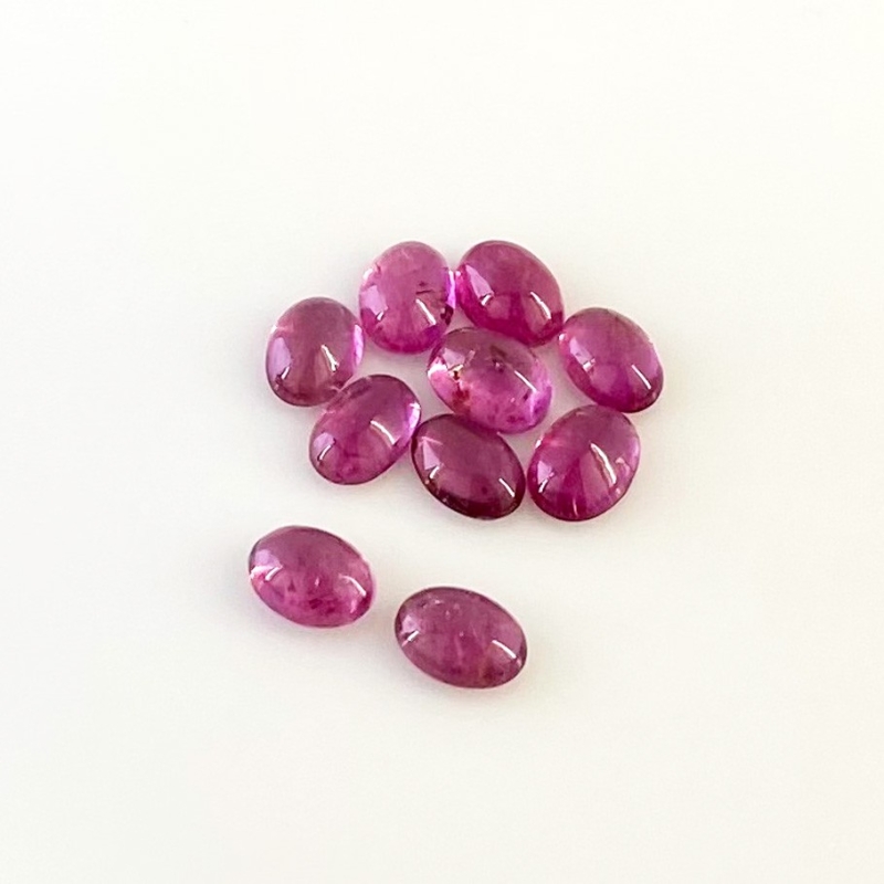 7.50 Cts. Rubellite Tourmaline 7x5mm Smooth Oval Shape A Grade Cabochons Parcel - Total 10 Pcs.