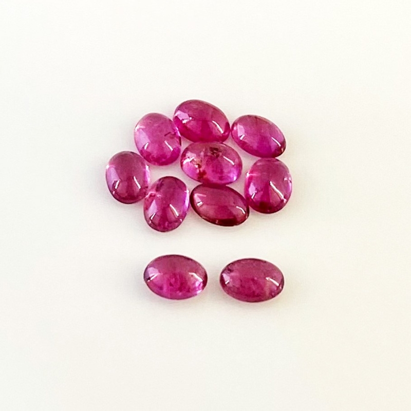 7.50 Cts. Rubellite Tourmaline 7x5mm Smooth Oval Shape A Grade Cabochons Parcel - Total 10 Pcs.