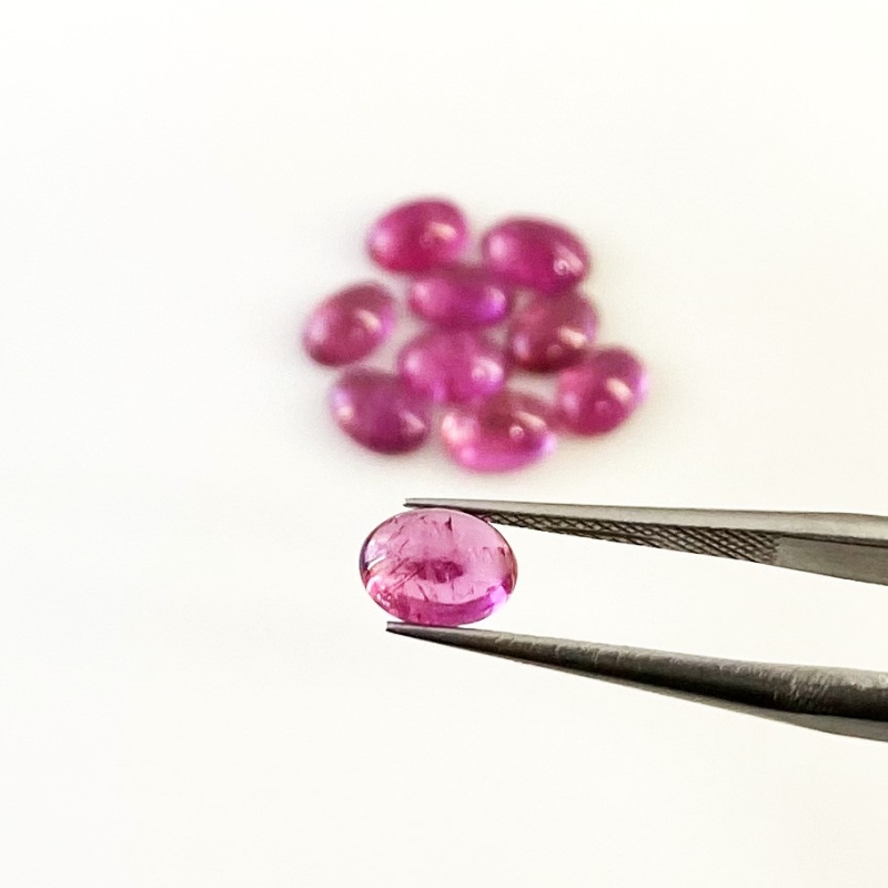 7.50 Cts. Rubellite Tourmaline 7x5mm Smooth Oval Shape A Grade Cabochons Parcel - Total 10 Pcs.