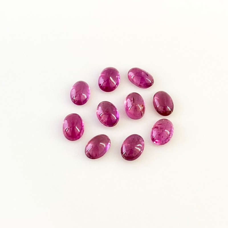 7.50 Cts. Rubellite Tourmaline 7x5mm Smooth Oval Shape A Grade Cabochons Parcel - Total 10 Pcs.