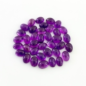 31.90 Carat African Amethyst 7x5mm Smooth Oval Shape A Grade Cabochons Parcel - Total 37 Pcs.