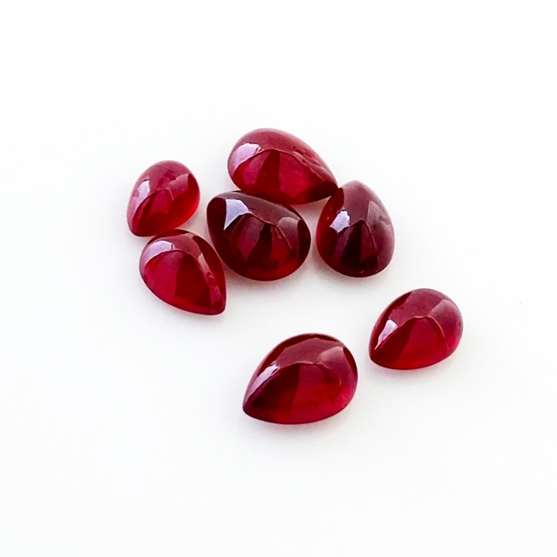 15.55 Cts. Ruby 7x5-9x7mm Smooth Pear Shape AA Grade Cabochons Parcel - Total 7 Pcs.