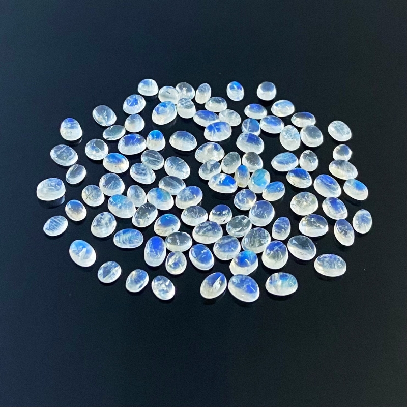 47.95 Cts. Rainbow Moonstone 6.5x4.5-5x3mm Smooth Oval Shape AA+ Grade Cabochons Parcel - Total 94 Pcs.