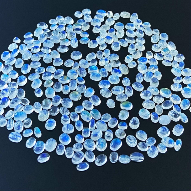 155.25 Cts. Rainbow Moonstone 4X3-7X5mm Smooth Oval Shape AA+ Grade Cabochons Parcel - Total 261 Pcs.