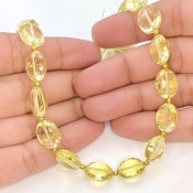 Lemon Quartz 12mm Faceted Oval Shape AAA+ Grade Gemstone Beads Strand - Total 1 Strand of 11 Inch.