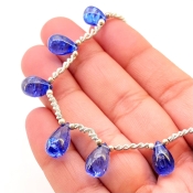 Tanzanite 7.5-13mm Smooth Drop Shape AA+ Grade Gemstone Beads Layout - Total 1 Strand of 9 Inch.