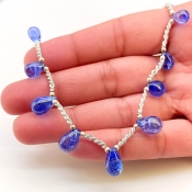 Tanzanite 7.5-13mm Smooth Drop Shape AA+ Grade Gemstone Beads Layout - Total 1 Strand of 9 Inch.