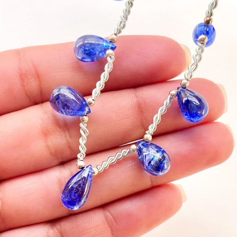 Tanzanite 7.5-13mm Smooth Drop Shape AA+ Grade Gemstone Beads Layout - Total 1 Strand of 9 Inch.