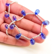 Tanzanite 7.5-13mm Smooth Drop Shape AA+ Grade Gemstone Beads Layout - Total 1 Strand of 9 Inch.