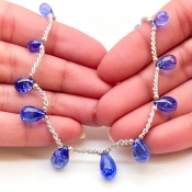 Tanzanite 7.5-13mm Smooth Drop Shape AA+ Grade Gemstone Beads Layout - Total 1 Strand of 9 Inch.