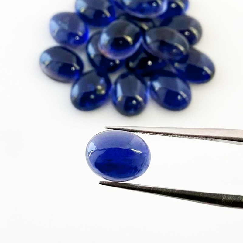 31.85 Carat Iolite 9x7mm Smooth Oval Shape A Grade Cabochons Parcel - Total 17 Pcs.