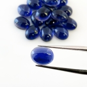 31.85 Carat Iolite 9x7mm Smooth Oval Shape A Grade Cabochons Parcel - Total 17 Pcs.