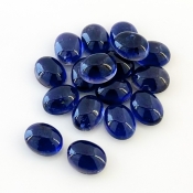 31.85 Carat Iolite 9x7mm Smooth Oval Shape A Grade Cabochons Parcel - Total 17 Pcs.