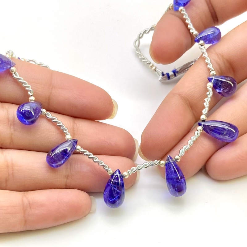 Tanzanite 9.5-15mm Smooth Drop Shape AA+ Grade Gemstone Beads Layout - Total 1 Strand of 9 Inch.