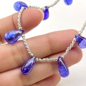 Tanzanite 9.5-15mm Smooth Drop Shape AA+ Grade Gemstone Beads Layout - Total 1 Strand of 9 Inch.