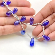 Tanzanite 9.5-15mm Smooth Drop Shape AA+ Grade Gemstone Beads Layout - Total 1 Strand of 9 Inch.