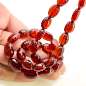 Hessonite Garnet 10-15mm Smooth Oval Shape AAA Grade Gemstone Beads Strand - Total 1 Strand of 15 Inch.