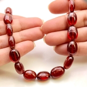 Hessonite Garnet 10-15mm Smooth Oval Shape AAA Grade Gemstone Beads Strand - Total 1 Strand of 15 Inch.