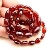 Hessonite Garnet 10-15mm Smooth Oval Shape AAA Grade Gemstone Beads Strand - Total 1 Strand of 15 Inch.