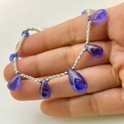 Tanzanite 12-16.5mm Smooth Drop Shape AA+ Grade Gemstone Beads Layout - Total 1 Strand of 8 Inch.