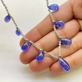 Tanzanite 10-16mm Smooth Drop Shape AA+ Grade Gemstone Beads Layout - Total 1 Strand of 8 Inch.